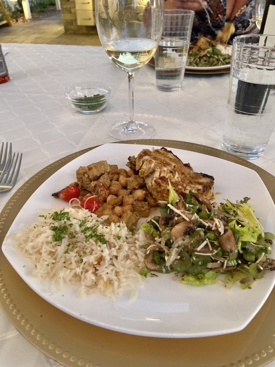 Plated chicken rice and salad