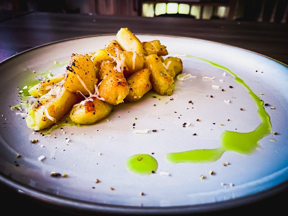 Pan fried gnocchi with basil oil